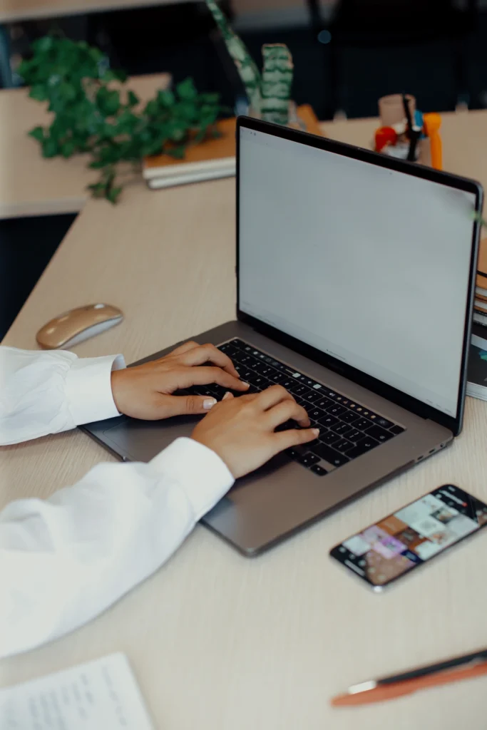 young woman typing on keyboard at desk 2023 11 27 05 23 33 utc result 11zon 1